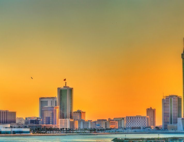Skyline of Manama at sunset. The Kingdom of Bahrain