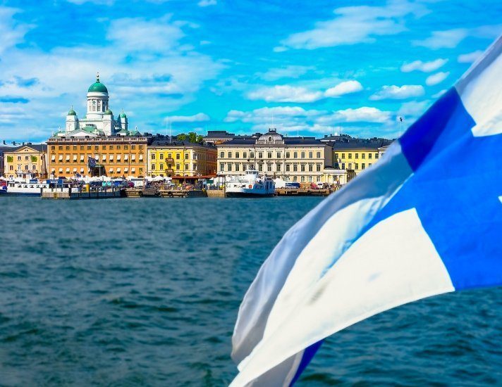 Helsinki, Finland  Market Square and Helsinki Cathedral and Finland flag